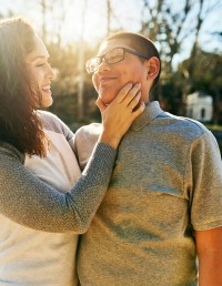 Photo of two young people hugging