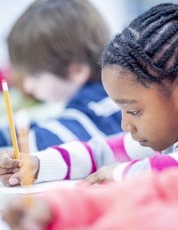 Students writing in class